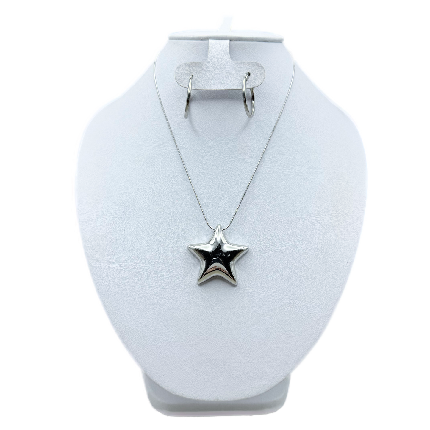 Juego de arracadas y dije de estrellas