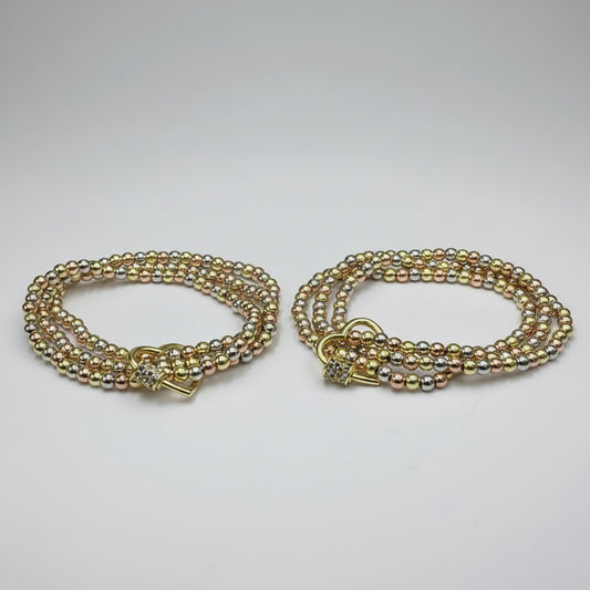 Brazalete de acero tricolor