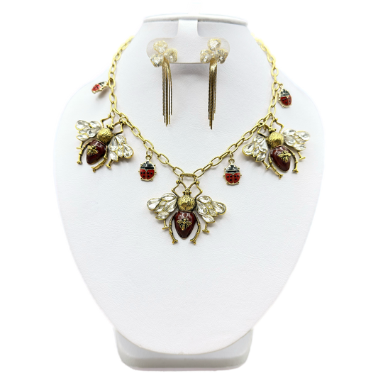 Juego de bichos con catarinas y aretes