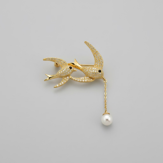 Broche de aves